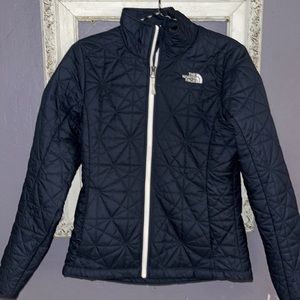 The North Face blue and white puffer jacket size SMALL petite